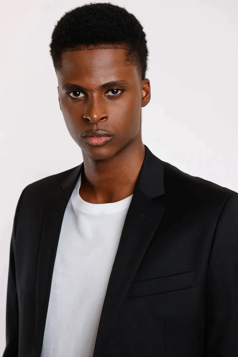 COSTUME LÃ SUPER SLIM FALSO LISO PRETO